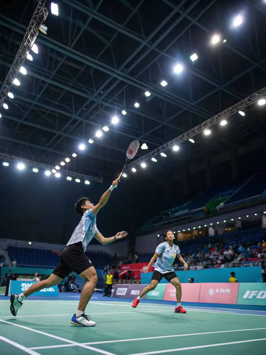 An image of students participating in a badminton tournament, showcasing precision and agility in this inter-faculty sports competition.